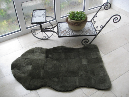 Lammfell Patchwork Teppich graugruen